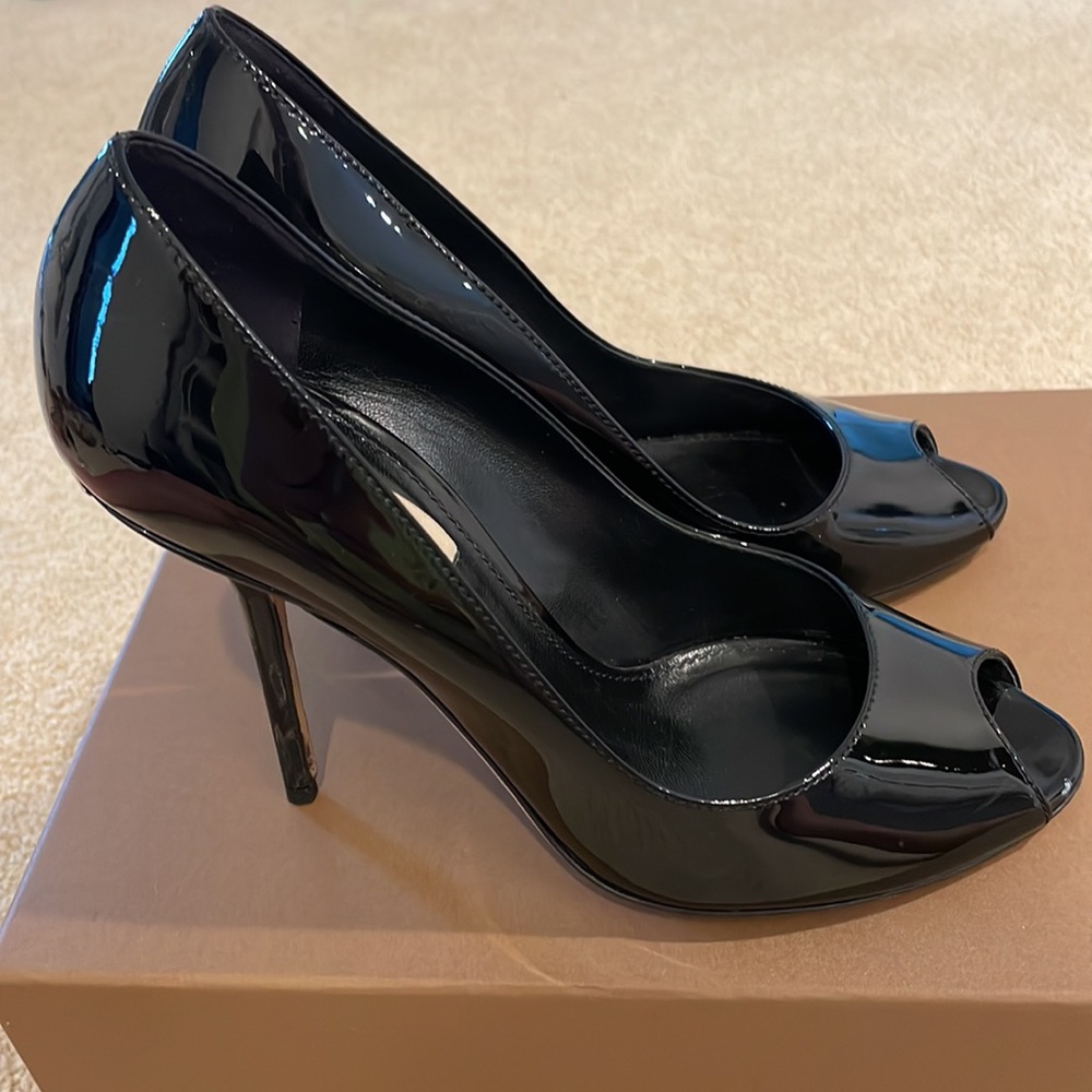 Burberry patent leather peep toe heels.